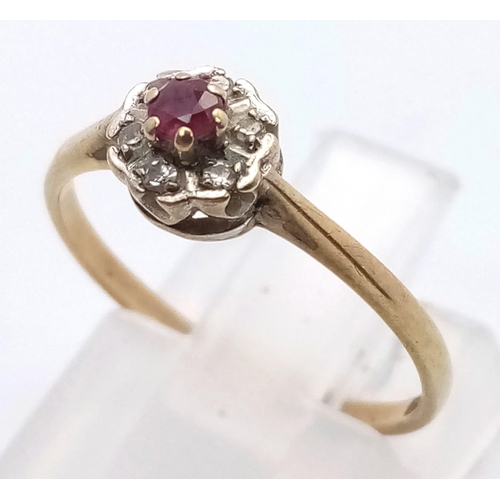 798 - 9K YELLOW GOLD DIAMOND & RUBY CLUSTER RING. TOTAL WEIGHT 1.2G SIZE L