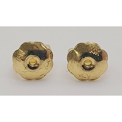 1009 - A Pair of 14K Gold Sapphire and Diamond Detachable Screw-Clasp Earrings. 4.2g total weight.