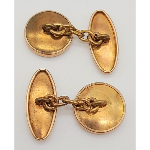 1014 - A Pair of Vintage Mother of Pearl and Gilded Metal Cufflinks.