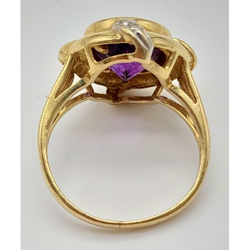 1055 - A Vintage 14K Yellow Gold Amethyst and Diamond Ring. A 3ct quality, clean amethyst with diamond comp... 