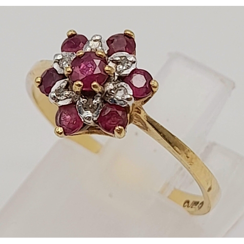 1132 - A Vintage 9K Yellow Gold Ruby and Diamond Ring. Size N. 1.52g.