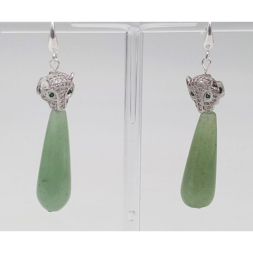 1272 - A Pair of Jade Leopard Drop earrings. 4cm