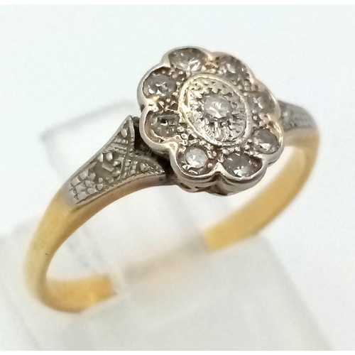 138 - An 18 K yellow gold and platinum vintage ring with a cluster of diamonds. Ring size: M, weight: 2.8 ... 