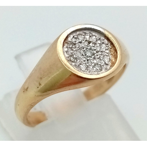 152 - 9K YELLOW GOLD DIAMOND SET SIGNET RING. TOTAL WEIGHT 2.6G SIZE K 1/2