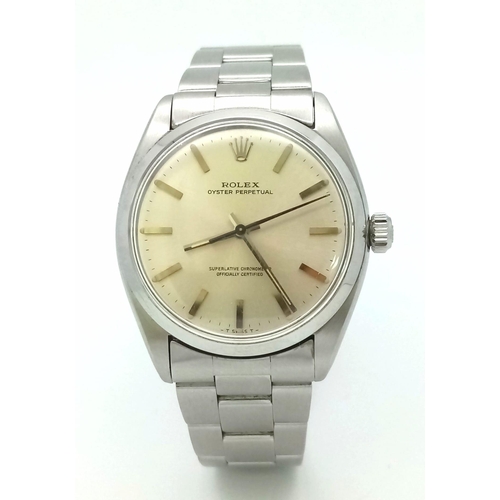 213 - A stainless steel ROLEX Oyster perpetual watch. Case, 34 mm, white wine coloured dial, automatic mec... 