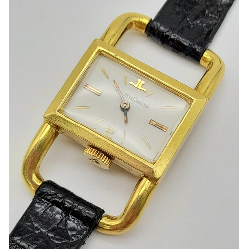 246 - A vintage 18 K yellow gold JAEGER-LE COULTRE ladies watch. Case: 20 x 15 mm, white dial with gold ho... 