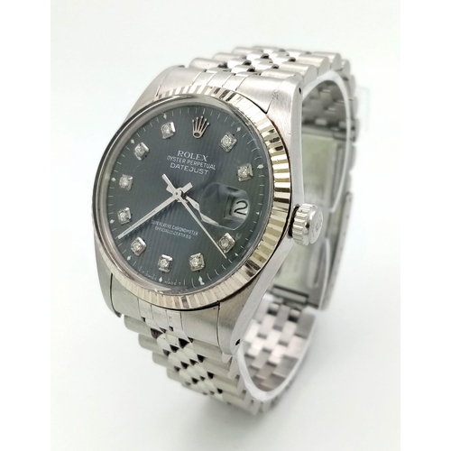 59 - A stainless steel ROLEX OYSTER PERPETUAL DATEJUST watch. Case 36 mm, calibrated bezel, unusual strip... 