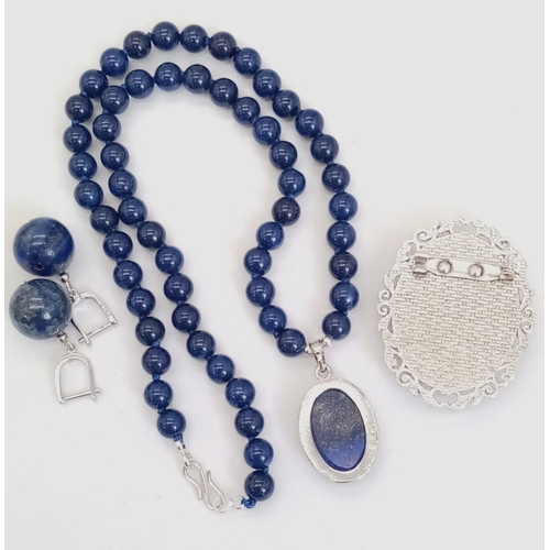 611 - A Lapis Lazuli Jewellery Suite: Pendant, Earrings and Necklace with Pendant.