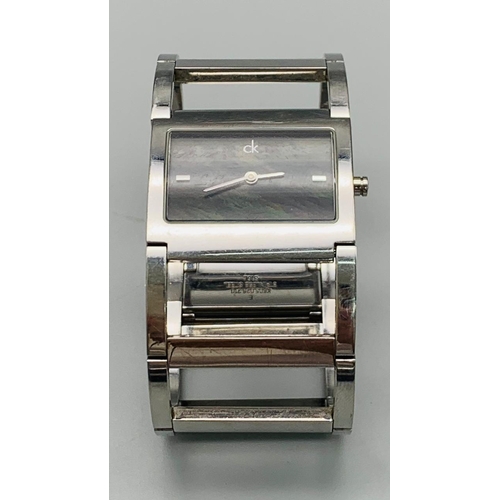 712 - CALVIN KLEIN CK BRACELET WATCH. BLACK MOTHER OF PEARL DIAL KO4281 00 FULL WORKING ORDER. EXCELENT CO... 