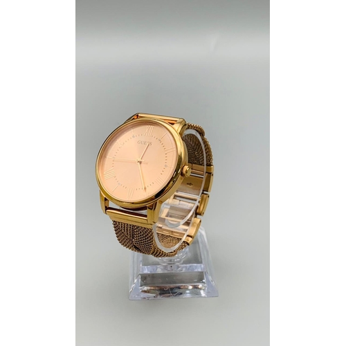 733 - GUESS ROSE GOLD TONE TWIST BRACELET WATCH MAIDEN MODEL REFERNCE W1143L3. FULL WORKING ORDER EXCELLEN... 