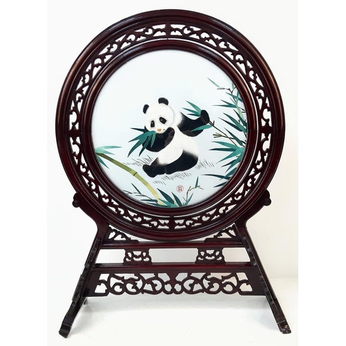 948 - A Vintage Chinese Panda Rotating Silk Artwork. A wonderful carved wooden stand holds the circular ch... 