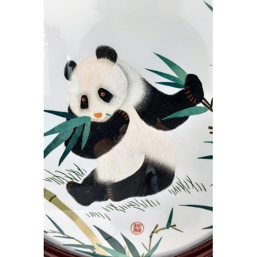 948 - A Vintage Chinese Panda Rotating Silk Artwork. A wonderful carved wooden stand holds the circular ch... 