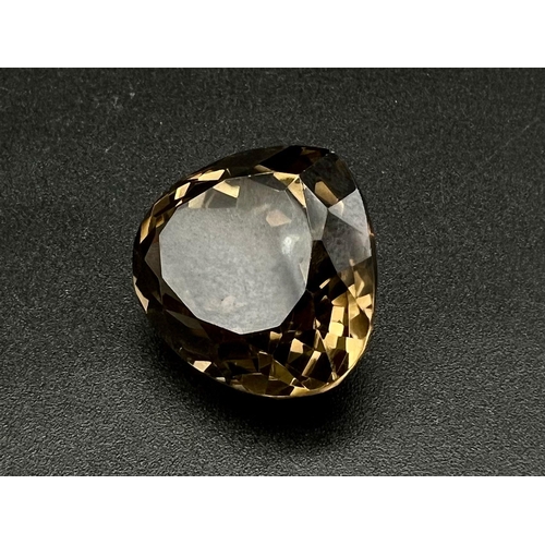 1144 - A 54.93ct Heart Shaped Smoky Quartz. No inclusions and comes with a GGI Certificate.