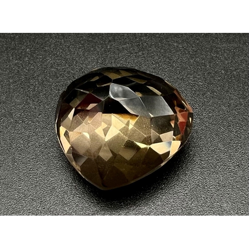 1144 - A 54.93ct Heart Shaped Smoky Quartz. No inclusions and comes with a GGI Certificate.