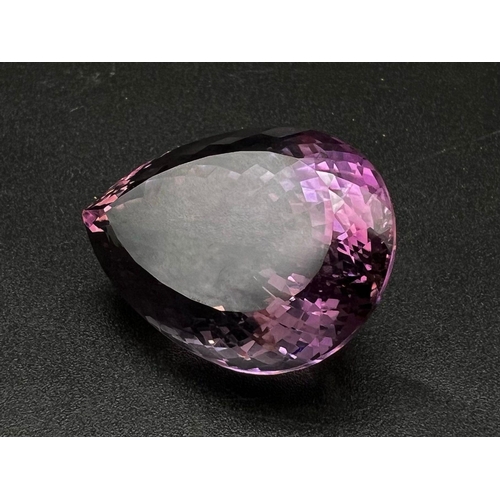 1377 - A 76.50ct Pear Shaped, Bolivian Amethyst Gemstone. Comes with an ITLGR certificate.