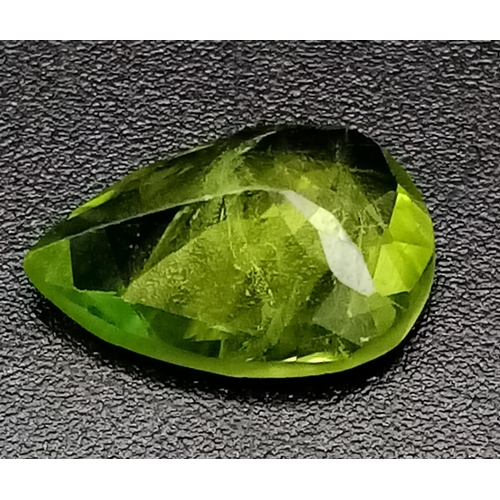 1235 - A 2.53ct Pakistani Peridot Gemstone. Pear shaped and comes with a GFCO Swiss Certificate.