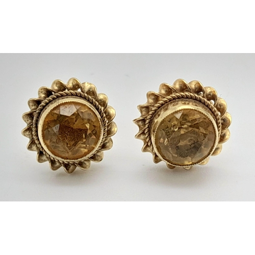 1082 - A Pair of 9K Yellow Gold Citrine Stud Earrings. 1.6g total weight.