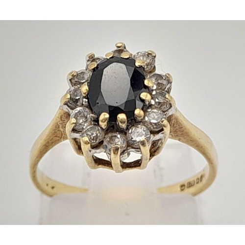 1237 - A Vintage 9K Yellow Gold Sapphire and Diamond Cluster Ring. Size K. 2.12g total weight.