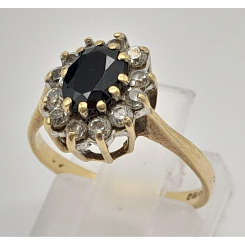 1237 - A Vintage 9K Yellow Gold Sapphire and Diamond Cluster Ring. Size K. 2.12g total weight.