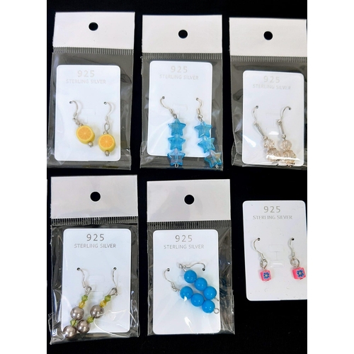 627 - A Parcel of 10 Pairs of New Ladies or Girls Sterling Silver Earrings Various Designs.