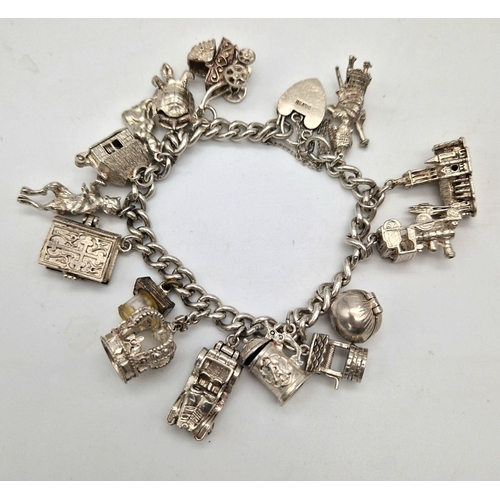 1270 - A 925 Silver Charm Bracelet with an Eclectic Mix of 15 Charms. Including: Vintage car, the crown and... 