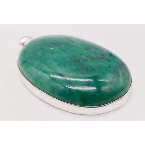 1370 - 925 Silver Necklace with Cabochon Emerald Pendant. Total Weight 40grams. 5cm x 4cm Pendant size.