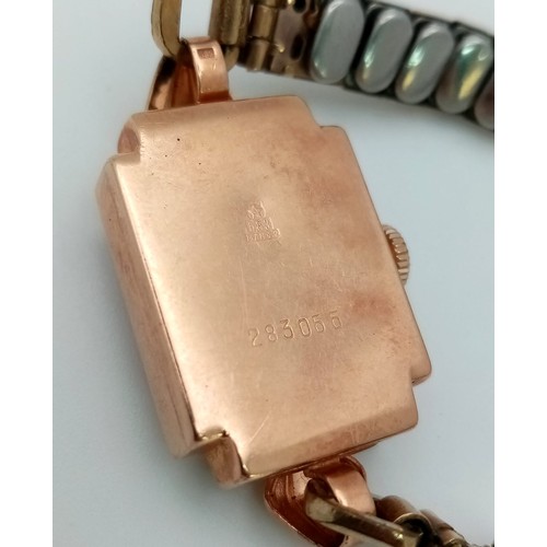 1278 - A Rare Vintage Russian 14K Gold Watch. Rolled gold expandable strap. 14k gold hallmarked case. 17mm.... 