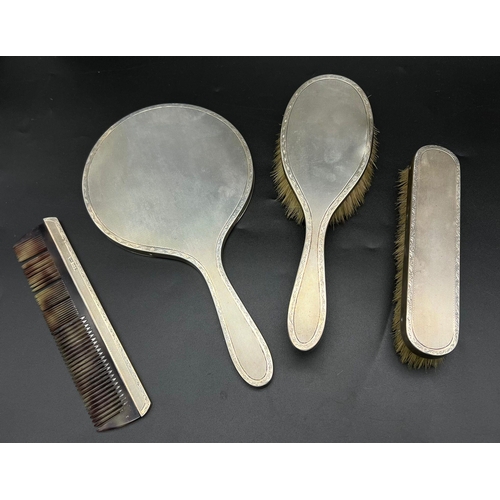 1320 - A Vintage Sterling Silver Dressing Table Set. Hair brush, clothes brush, hand-mirror and large comb.... 