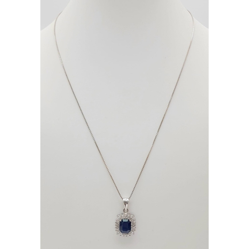 135 - An 18K White Gold, Sapphire and Diamond Pendant on an 18K White Gold Necklace. Rectangular 2ct sapph... 