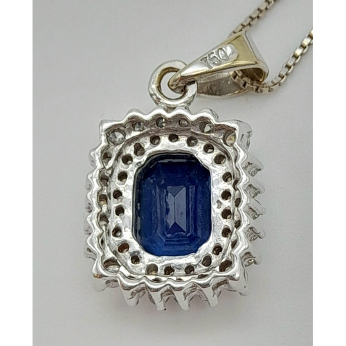 135 - An 18K White Gold, Sapphire and Diamond Pendant on an 18K White Gold Necklace. Rectangular 2ct sapph... 