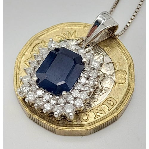 135 - An 18K White Gold, Sapphire and Diamond Pendant on an 18K White Gold Necklace. Rectangular 2ct sapph... 