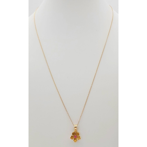 150 - An 18K Yellow Gold Ruby Floral Pendant on an 18K Yellow Gold Necklace. 2cm and 46cm. 2.65g total wei... 