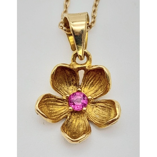 150 - An 18K Yellow Gold Ruby Floral Pendant on an 18K Yellow Gold Necklace. 2cm and 46cm. 2.65g total wei... 