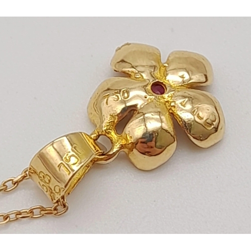 150 - An 18K Yellow Gold Ruby Floral Pendant on an 18K Yellow Gold Necklace. 2cm and 46cm. 2.65g total wei... 