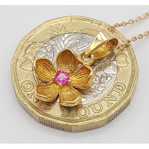 150 - An 18K Yellow Gold Ruby Floral Pendant on an 18K Yellow Gold Necklace. 2cm and 46cm. 2.65g total wei... 