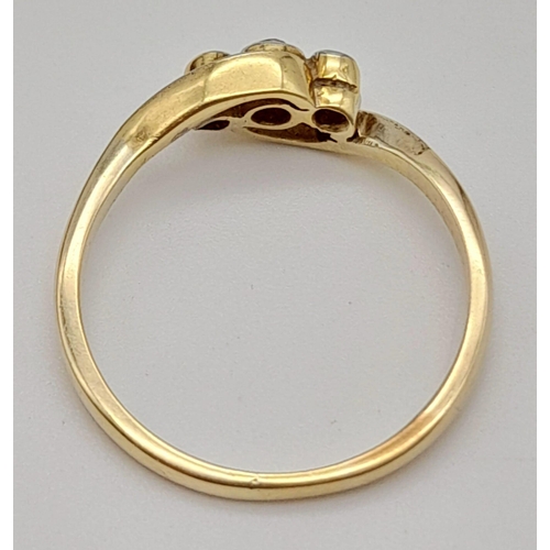 258 - An 18 K yellow gold and platinum ring with a trilogy of diamonds. Ring size: M, weight: 2.1 g.