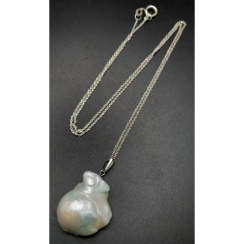 100 - A Large South Sea Baroque Pearl Pendant on an 18K White Gold Necklace. 3cm and 42cm. 9.1g total weig... 