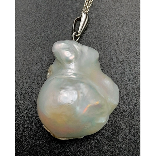 100 - A Large South Sea Baroque Pearl Pendant on an 18K White Gold Necklace. 3cm and 42cm. 9.1g total weig... 