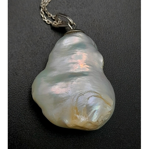 100 - A Large South Sea Baroque Pearl Pendant on an 18K White Gold Necklace. 3cm and 42cm. 9.1g total weig... 