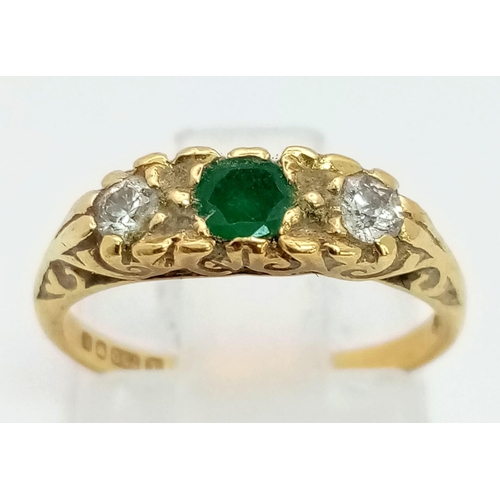 15 - A Vintage 18K Yellow Gold Emerald and Diamond Ring. Size H. 2.5g total weight.