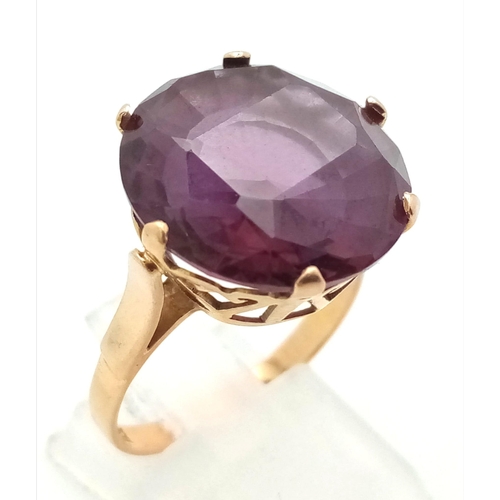 4 - A Vintage Possibly Antique Middle-Eastern 18K Rose Gold Amethyst Ring. Large round-cut, well faceted... 