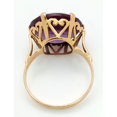 4 - A Vintage Possibly Antique Middle-Eastern 18K Rose Gold Amethyst Ring. Large round-cut, well faceted... 