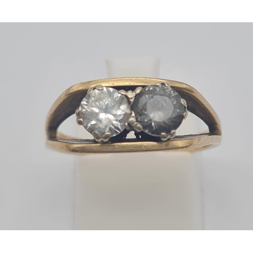 526 - A Vintage 9K Yellow Gold Two Stone Ring. White and grey stone. Size P. 3.6g total weight.