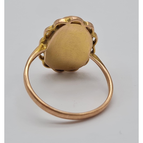 631 - 9K YELLOW GOLD CAMEO RING. TOTAL WEIGHT 3.4G SIZE Q