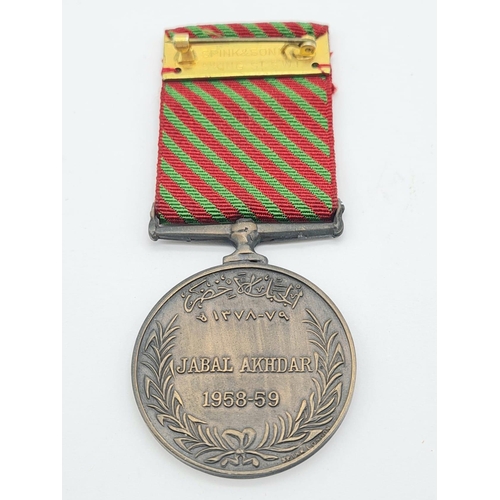 85 - A scarce example of the Omani Jebel Akhdar (Green Mountain) campaign medal, awarded by the Sultan of... 