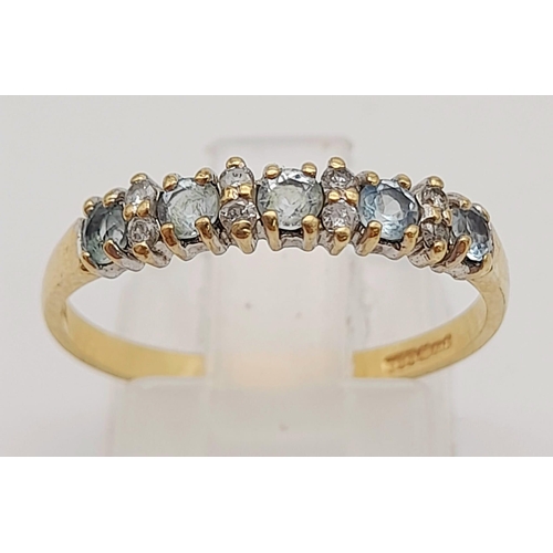 1001 - 9K YELLOW GOLD DIAMOND & TOPAZ BAND RING. TOTAL WEIGHT 1.4G SIZE P