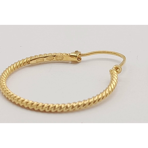 1006 - 9k yellow gold twisted hoop earrings 2.2g