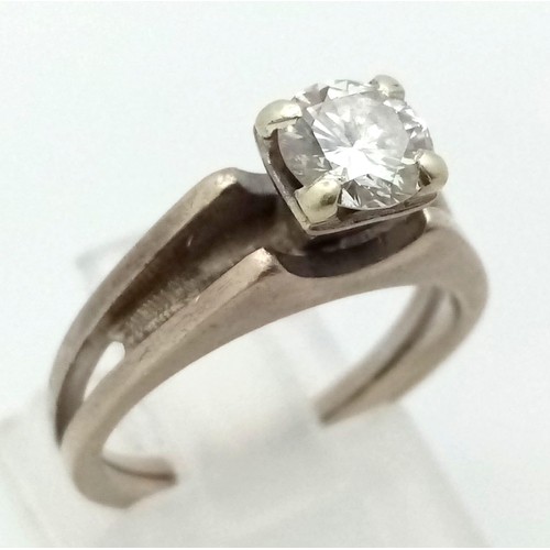 1062 - A Platinum Diamond Solitaire Ring. A 0.75ct (approx) brilliant cut white diamond. Size J 1/2. 3.55g ... 