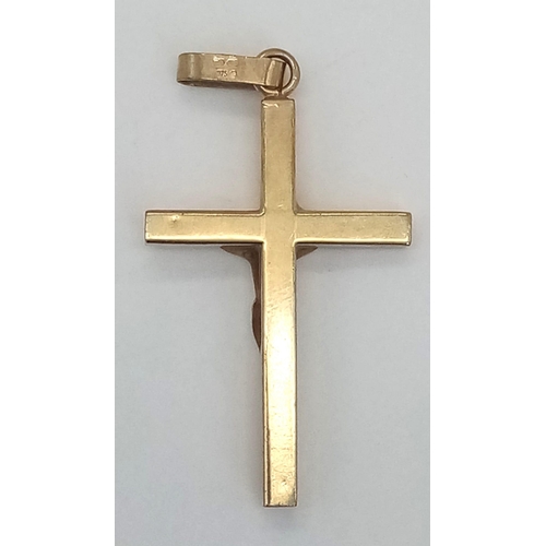 507 - A 9K Yellow and White Gold Vintage Crucifix. 5cm x 2cm. 1.82g