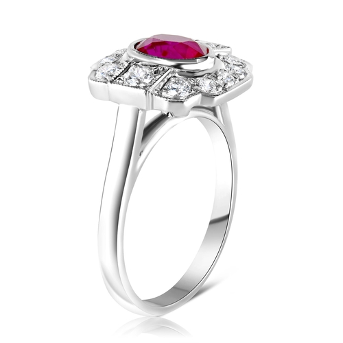 183 - 18k white gold Ruby and Diamond ring, 1.11ct oval ruby centre and 0.46ct diamonds surrounding, size ... 